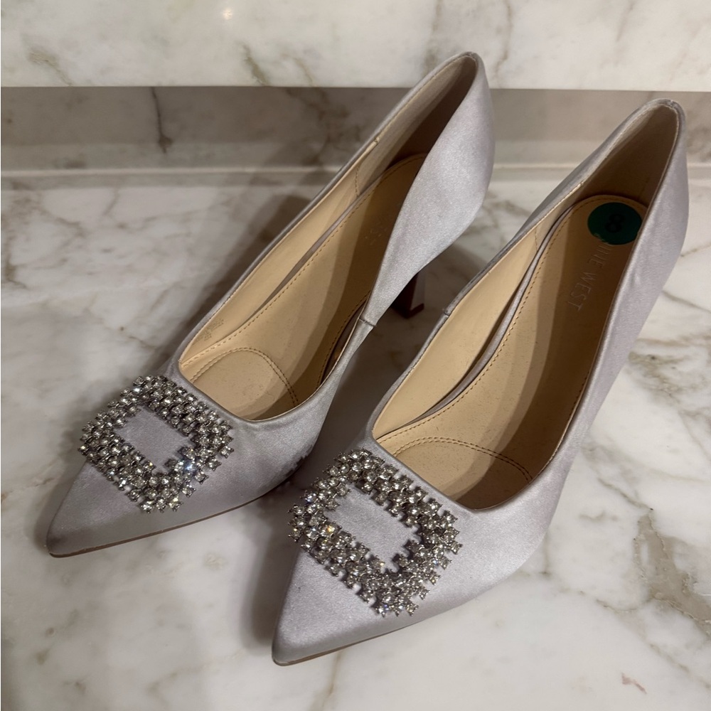 Brand new Nine West Silver Heels with Rhinestone Embellishments